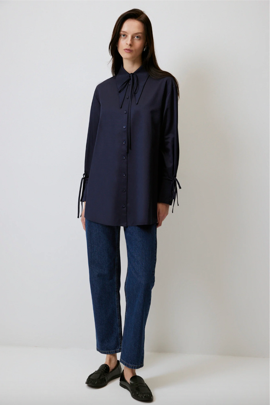 CAMISA CON DETALLE DE LAZADA