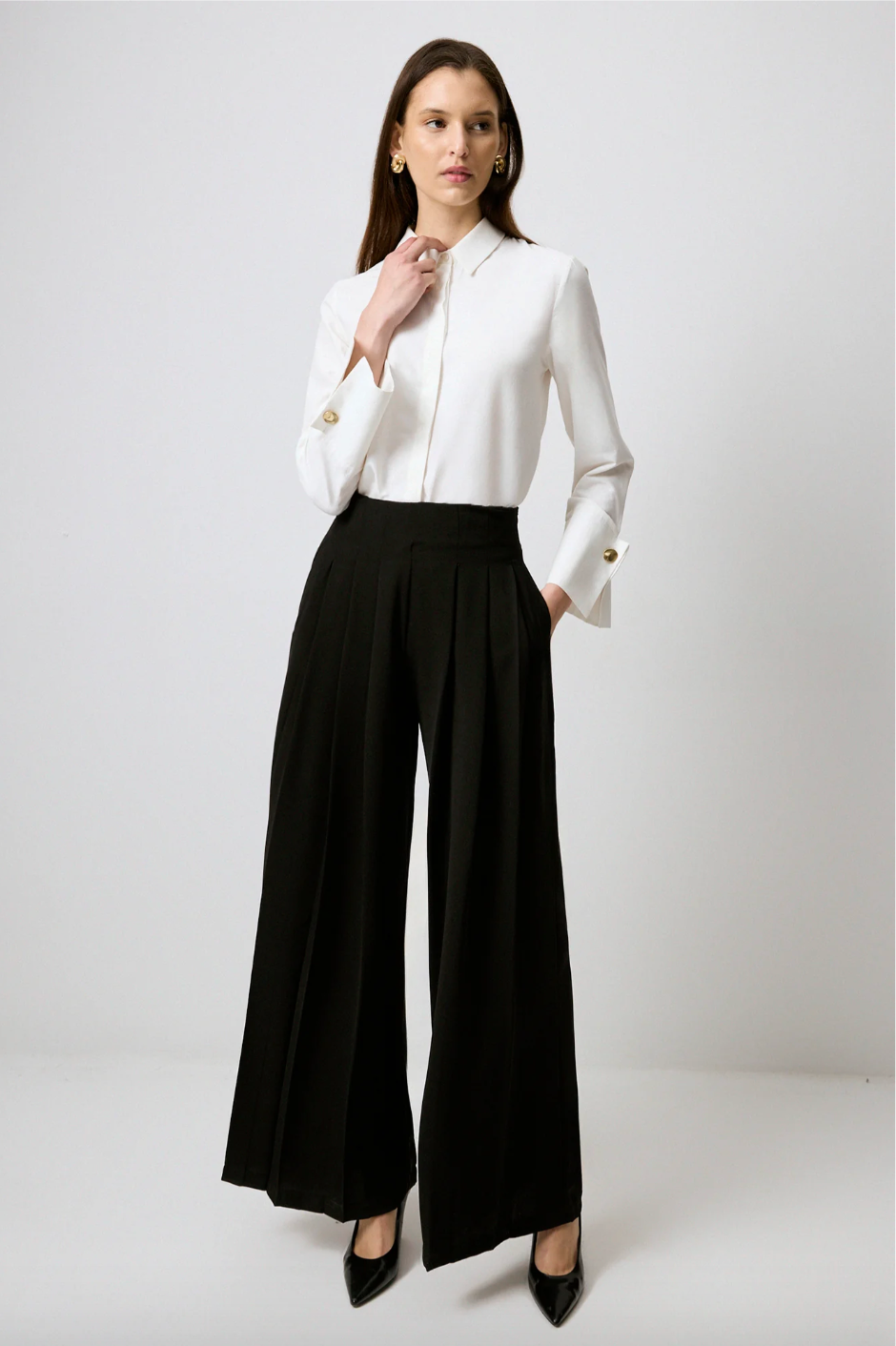 PANTALONES PLISADOS DE CREPÉ DE PIERNA ANCHA