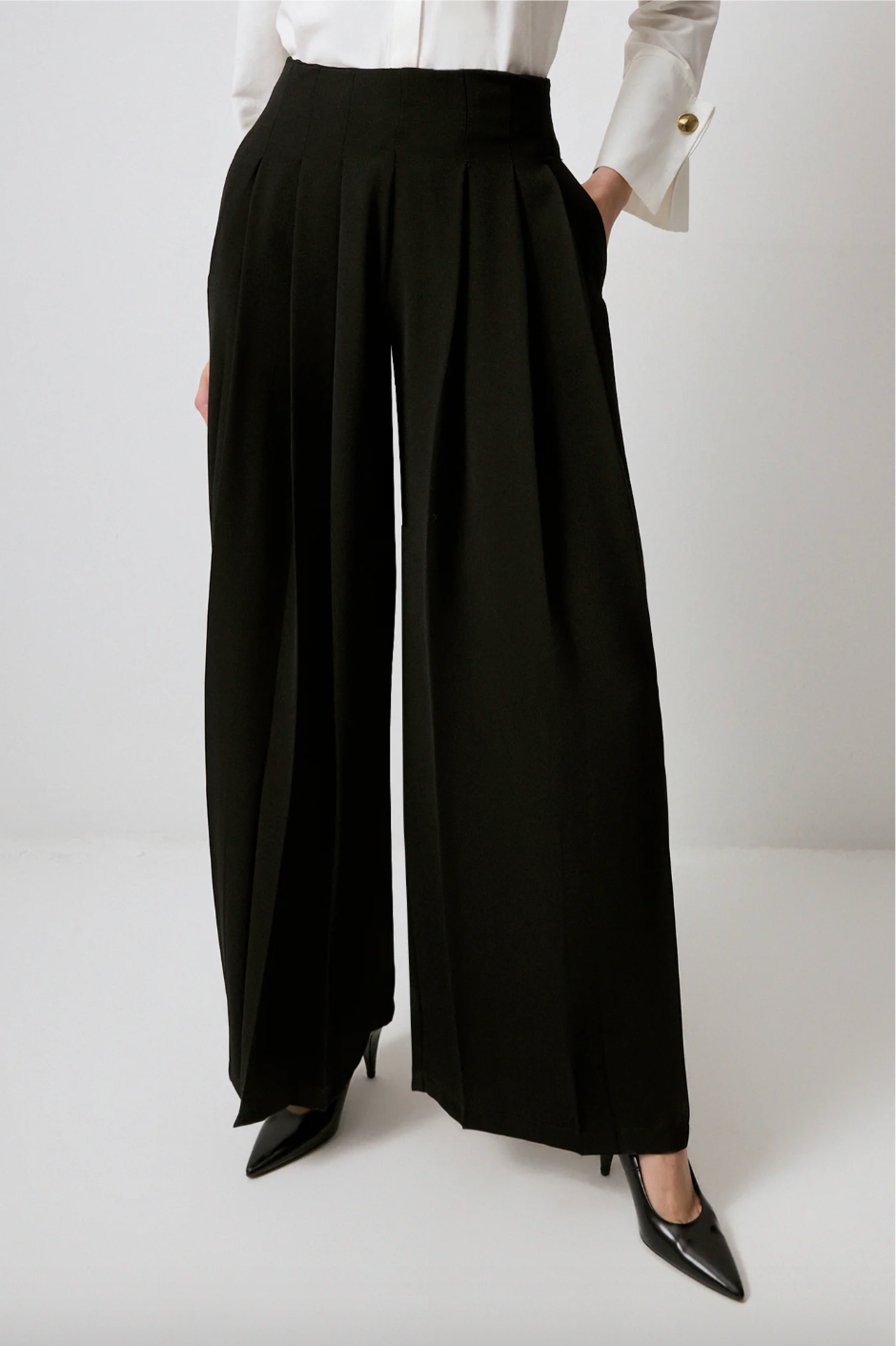 PANTALONES PLISADOS DE CREPÉ DE PIERNA ANCHA